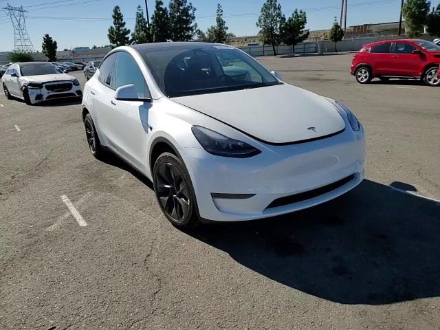 2025 Tesla Model Y VIN: 7SAYGDED3SF320485 Lot: 85011185