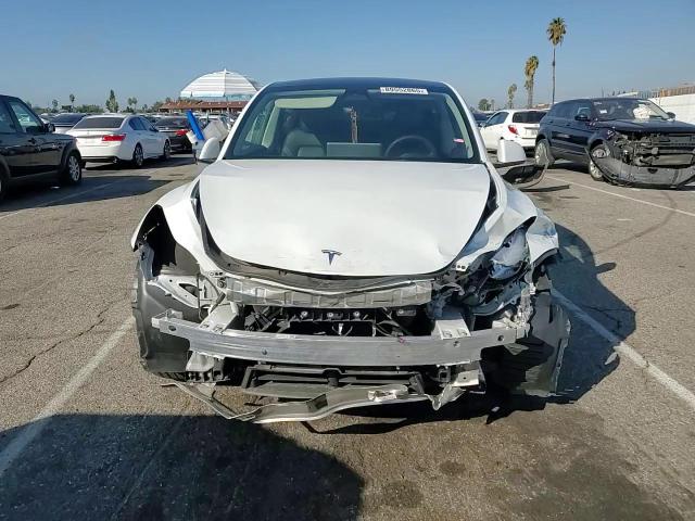 2023 Tesla Model Y VIN: 7SAYGDEE5PA121046 Lot: 89552865