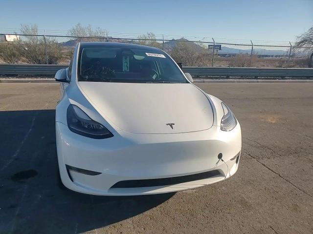 2023 Tesla Model Y VIN: 7SAYGDEE7PF938912 Lot: 89706255
