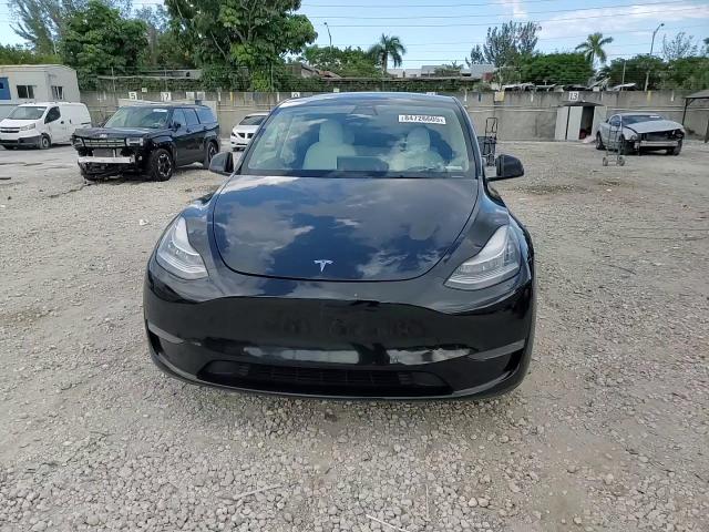 2021 Tesla Model Y VIN: 5YJYGDEF3MF099004 Lot: 84726605