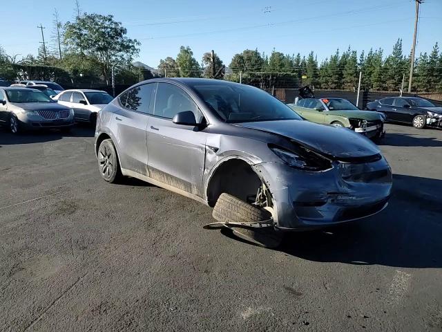 2023 Tesla Model Y VIN: 7SAYGDEE8PF910424 Lot: 82636635