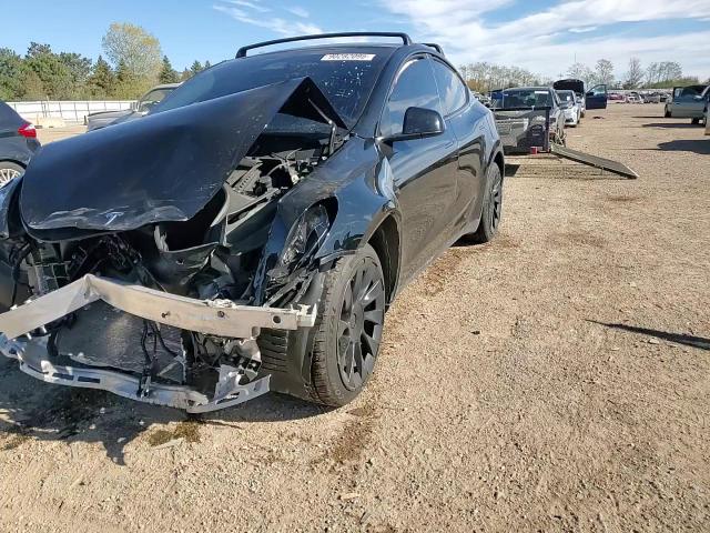 2023 Tesla Model Y VIN: 7SAYGDEE3PF859432 Lot: 90282095