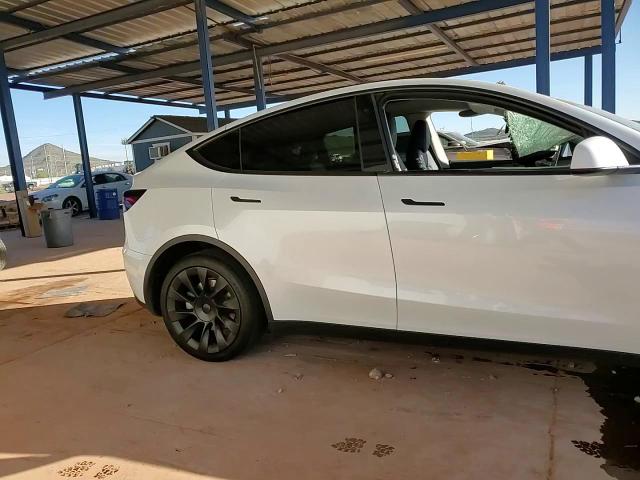 2023 Tesla Model Y VIN: 7SAYGDEE5PA026311 Lot: 90147165