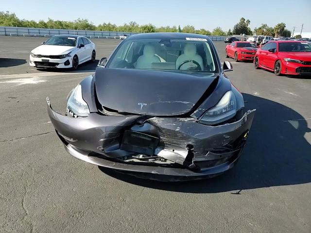 2018 Tesla Model 3 VIN: 5YJ3E1EA0JF169119 Lot: 90228105