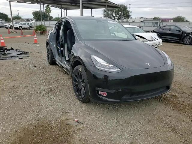 2023 Tesla Model Y VIN: 7SAYGDEE2PA118220 Lot: 85390805