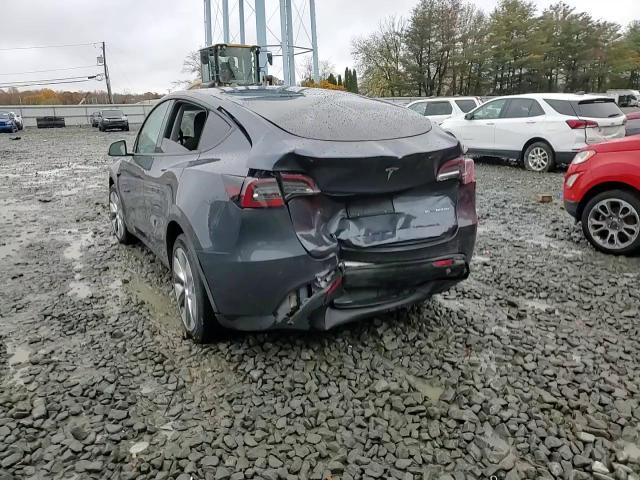 2023 Tesla Model Y VIN: 7SAYGDEE9PA100524 Lot: 89834715