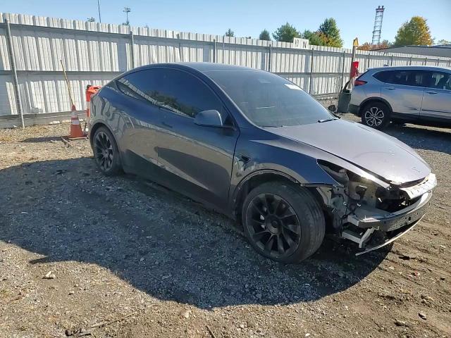 2023 Tesla Model Y VIN: 7SAYGAEE0PF706991 Lot: 85282995