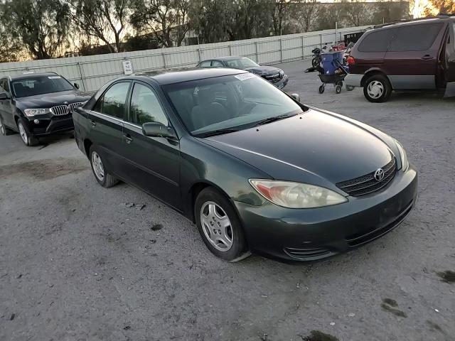 2003 Toyota Camry Le VIN: 4T1BF32K73U561506 Lot: 60168824