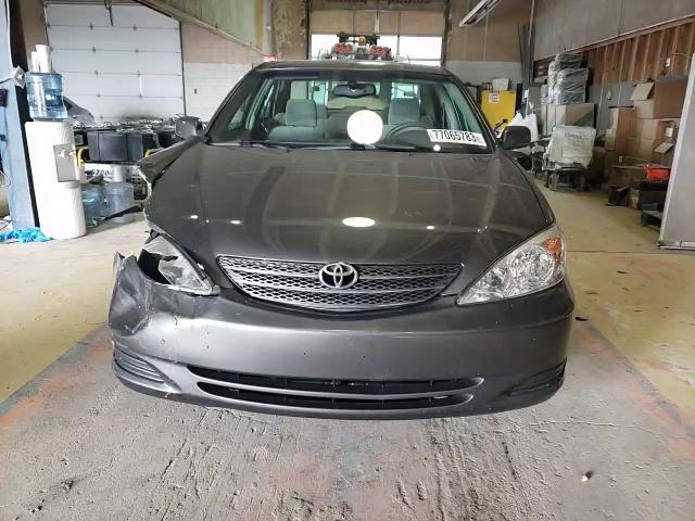 2003 Toyota Camry Le VIN: 4T1BE32K03U748427 Lot: 75170914