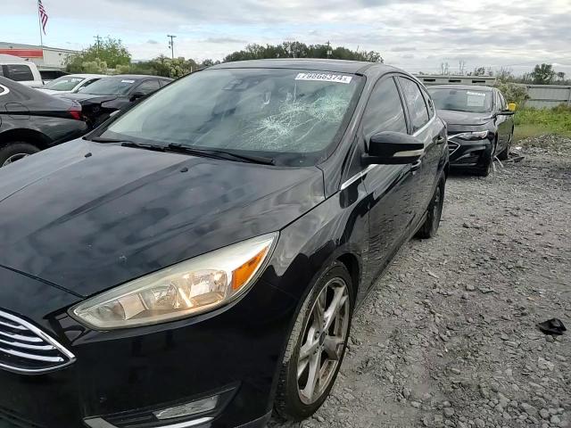 2015 Ford Focus Titanium VIN: 1FADP3N24FL340533 Lot: 79868374