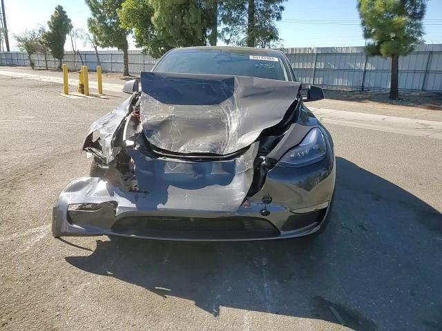 2024 Tesla Model Y VIN: 7SAYGDEDXRF112890 Lot: 80733404