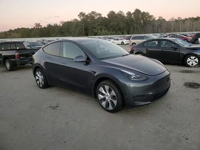 2023 Tesla Model Y VIN: 7SAYGDEE0PA165651 Lot: 80927194