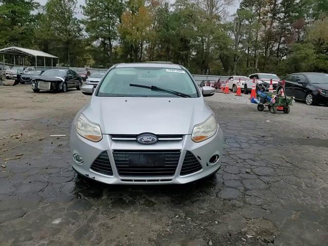 2014 Ford Focus Se VIN: 1FADP3F22EL319922 Lot: 79421404