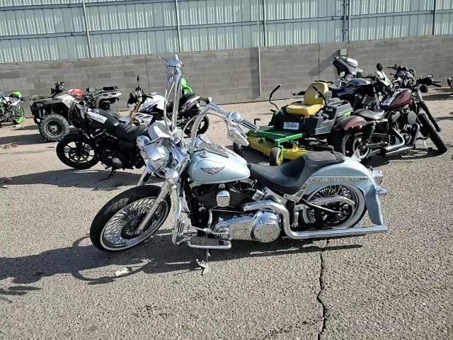 2014 Harley-Davidson Flstn Softail Deluxe VIN: 1HD1JDV14EB023110 Lot: 78897794