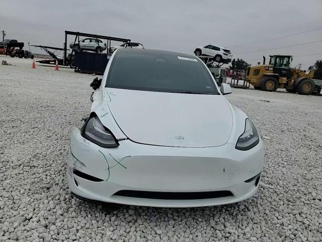 2023 Tesla Model Y VIN: 7SAYGDEE0PA070104 Lot: 77773654