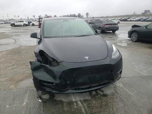 2023 Tesla Model Y VIN: 7SAYGDEFXPF738969 Lot: 74002524