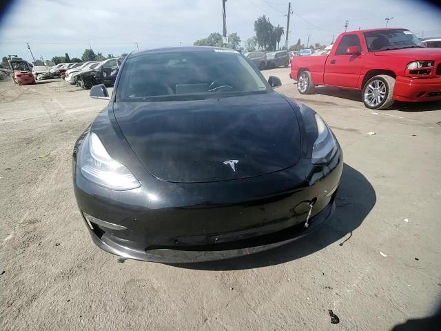 2018 Tesla Model 3 VIN: 5YJ3E1EA3JF004438 Lot: 77481904