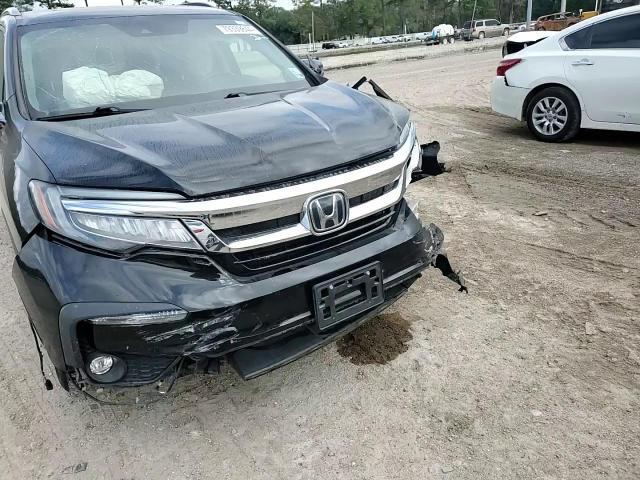 2021 Honda Pilot Touring VIN: 5FNYF5H96MB000075 Lot: 79339844