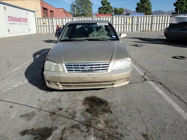 2002 Kia Optima Magentis VIN: KNAGD126X25156415 Lot: 80253444