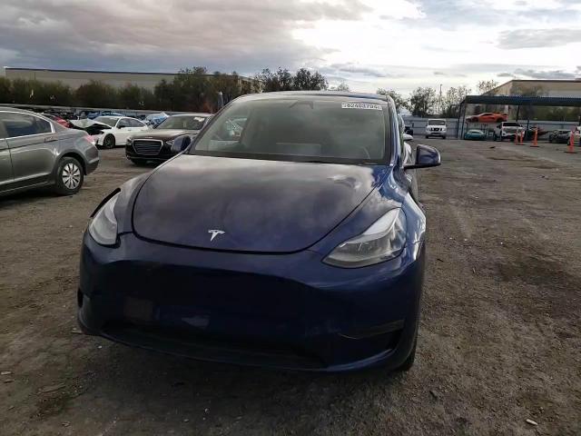 2023 Tesla Model Y VIN: 7SAYGDEE3PA204345 Lot: 82403794