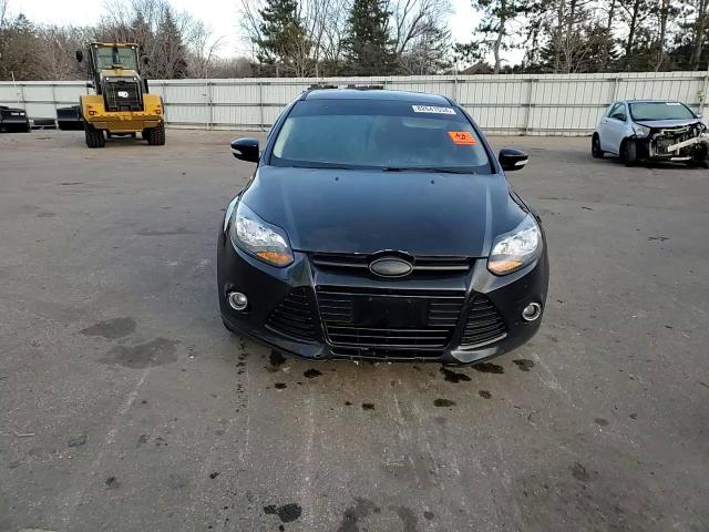 2013 Ford Focus Titanium VIN: 1FADP3J23DL352613 Lot: 82641554