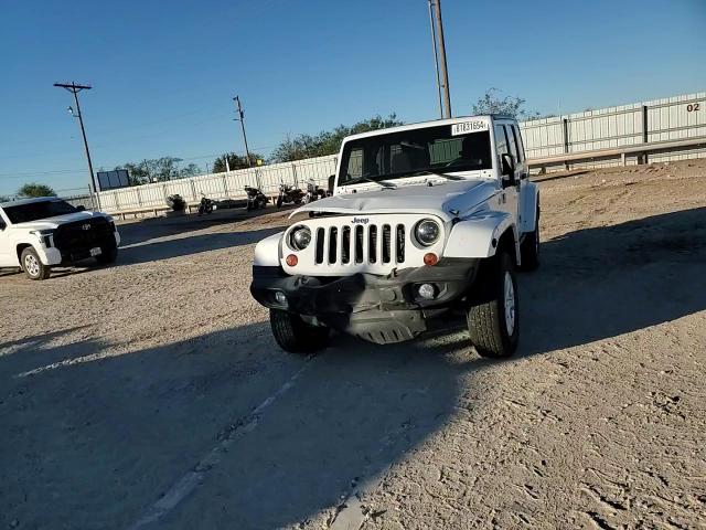 2012 Jeep Wrangler Unlimited Sport VIN: 1C4HJWDG4CL197624 Lot: 81831654