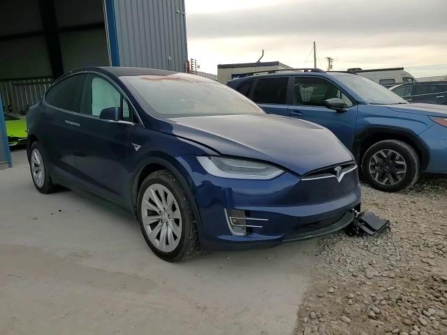 2018 Tesla Model X VIN: 5YJXCAE29JF140945 Lot: 80885854