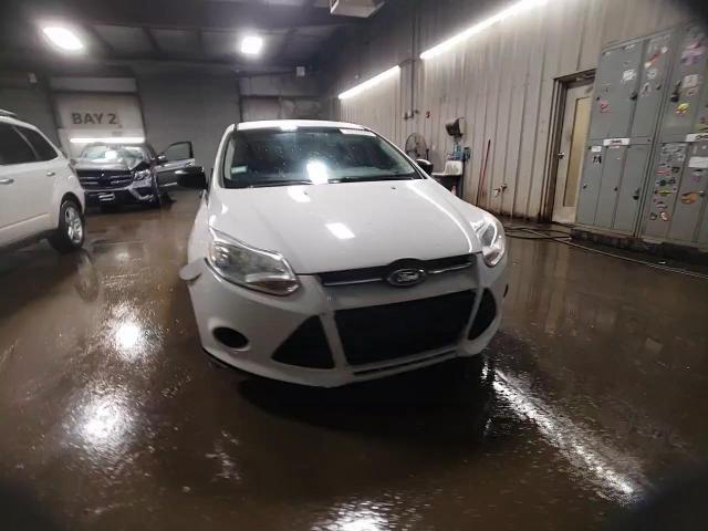 2013 Ford Focus S VIN: 1FADP3E2XDL276091 Lot: 78324094