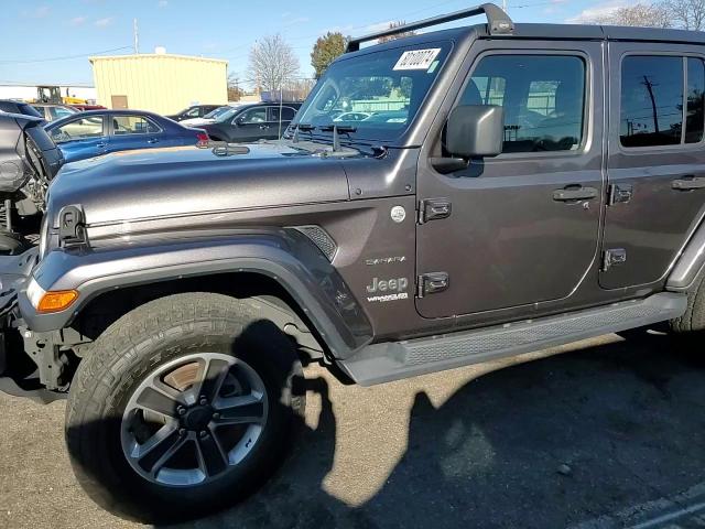 2018 Jeep Wrangler Unlimited Sahara VIN: 1C4HJXEN5JW142307 Lot: 80100074