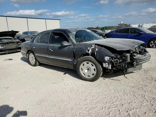 2001 Lincoln Continental VIN: 1LNHM97V21Y680964 Lot: 80640714