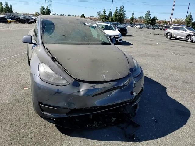 2023 Tesla Model Y VIN: 7SAYGDEE9PF637283 Lot: 80501894