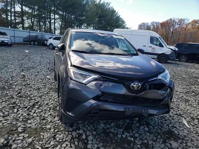 2018 Toyota Rav4 Le VIN: JTMBFREV9JJ233211 Lot: 79503844