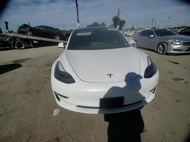 2022 Tesla Model 3 VIN: 5YJ3E1EB3NF145007 Lot: 79229334