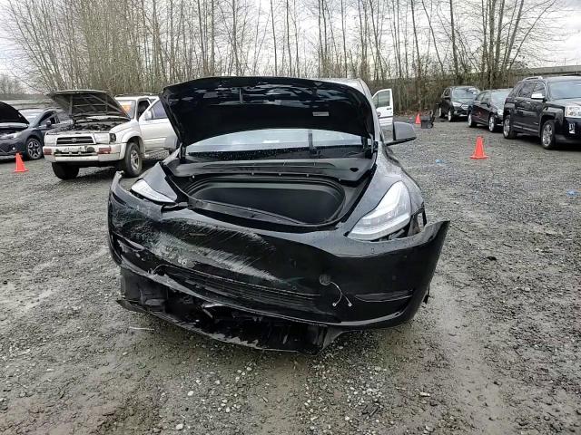 2022 Tesla Model Y VIN: 7SAYGDEE5NF400948 Lot: 82780404