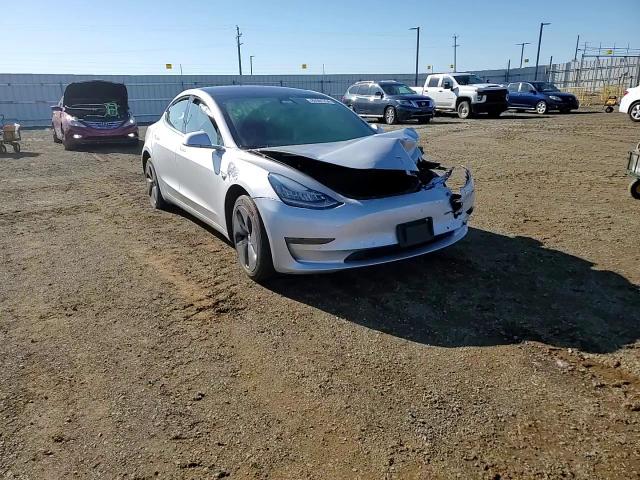 2018 Tesla Model 3 VIN: 5YJ3E1EA3JF077292 Lot: 80591734