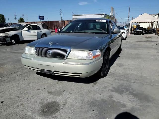 2004 Mercury Grand Marquis Gs VIN: 2MEFM74W34X663512 Lot: 79470754