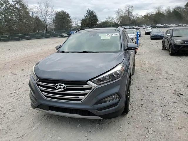 2018 Hyundai Tucson Value VIN: KM8J33A20JU621175 Lot: 79798304