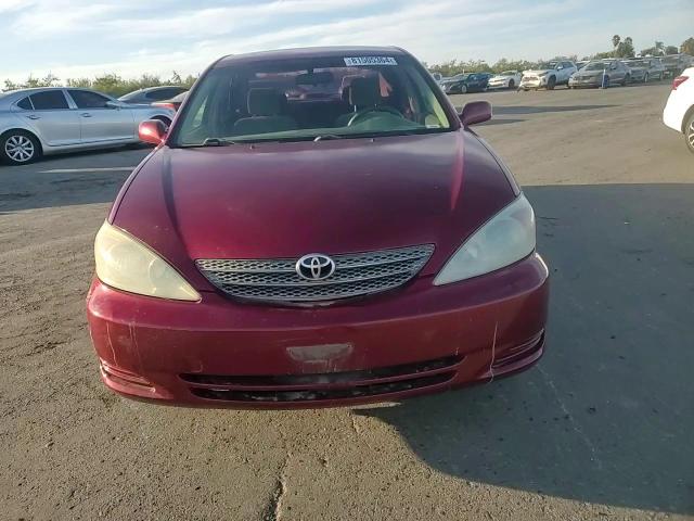 2003 Toyota Camry Le VIN: JTDBE32K930178018 Lot: 81505364