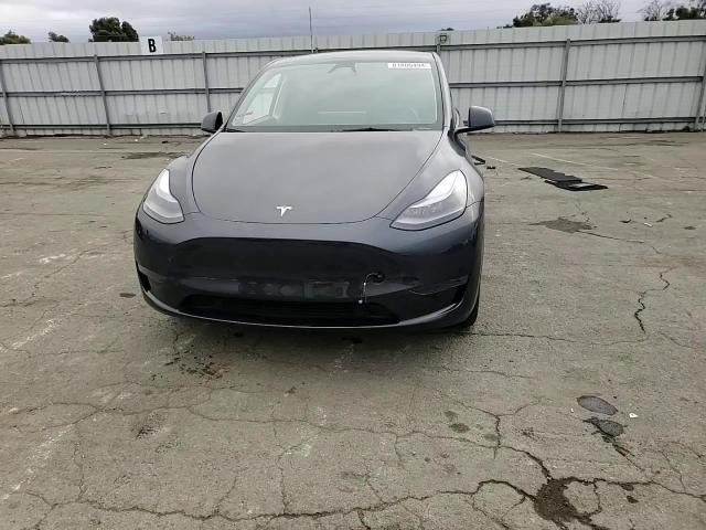 2024 Tesla Model Y VIN: 7SAYGDED4RF101660 Lot: 81806494