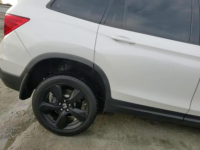 2020 Honda Passport Elite VIN: 5FNYF8H09LB001027 Lot: 82950684