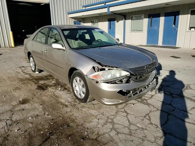 2003 Toyota Camry Le VIN: JTDBE32K330166950 Lot: 80000894