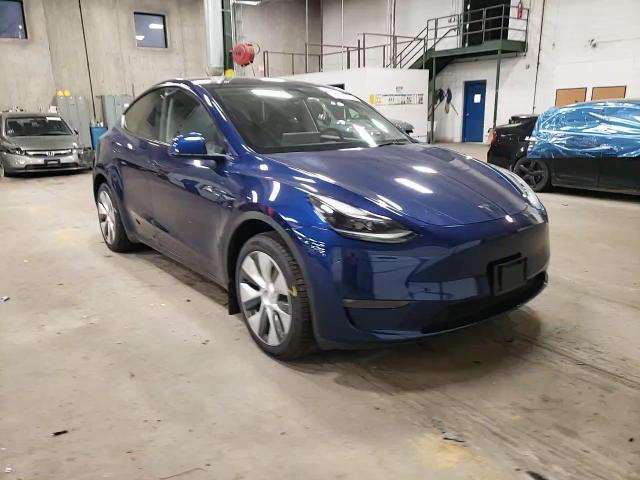 2023 Tesla Model Y VIN: 7SAYGDEE9PA188457 Lot: 80277954