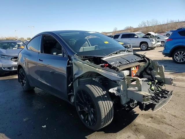 2023 Tesla Model Y VIN: 7SAYGDEEXPF792277 Lot: 80991924