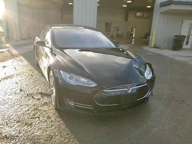 2014 Tesla Model S VIN: 5YJSA1H27EFP63112 Lot: 80888974