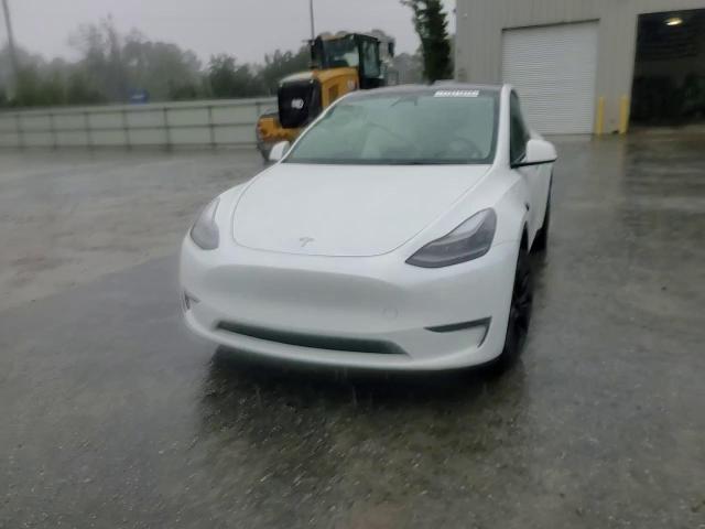 2023 Tesla Model Y VIN: 7SAYGDEE4PA190147 Lot: 77911474