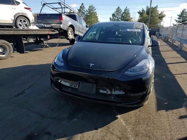 2023 Tesla Model Y VIN: 7SAYGDEE5PF664559 Lot: 79059174