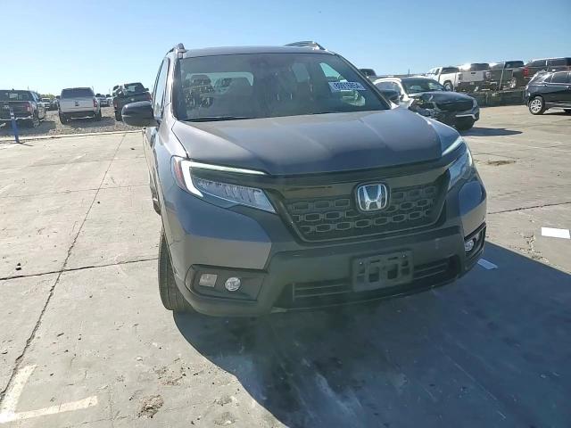 2021 Honda Passport Elite VIN: 5FNYF8H04MB034700 Lot: 80916854