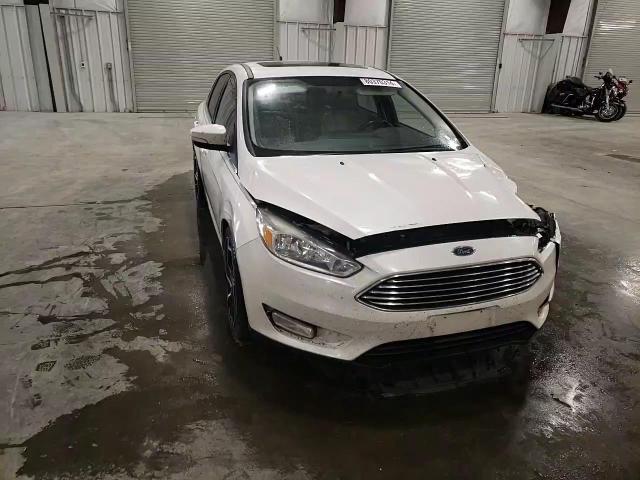 2015 Ford Focus Titanium VIN: 1FADP3J28FL221552 Lot: 80370314