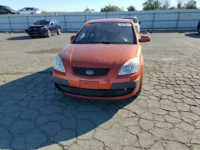 2009 Kia Rio Base VIN: KNADE223896467566 Lot: 79472874