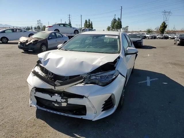 2017 Toyota Corolla L VIN: 5YFBURHE5HP703113 Lot: 79888894